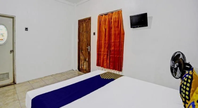 Bed in Hotel O Griya Sandi Residence Family NearPantai Boom