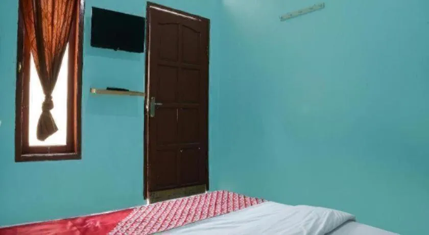 Bed in Hotel O Penginapan Raja