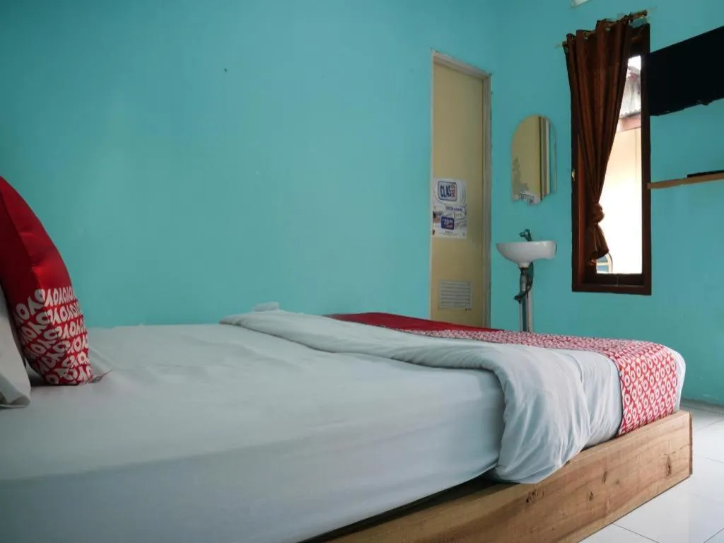 Bed in Hotel O Penginapan Raja