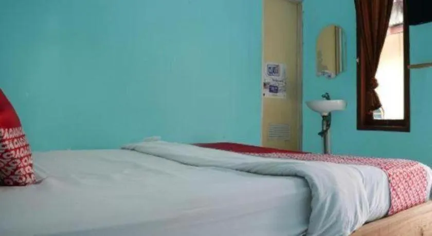 Bed in Hotel O Penginapan Raja