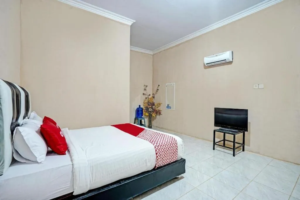 Bed in Hotel O Mutiara Homestay Syariah Near TPA / TPSA Nurul Yakin