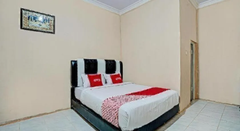 Bed in Hotel O Mutiara Homestay Syariah Near TPA / TPSA Nurul Yakin