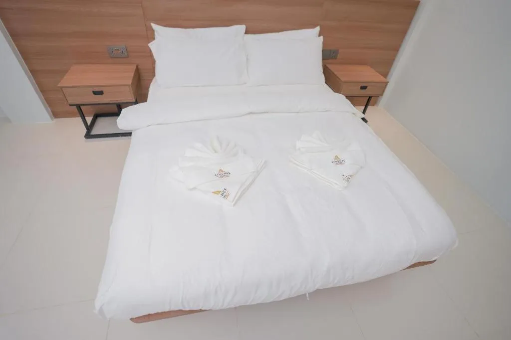 Bed in Athenee Hotel Vientiane