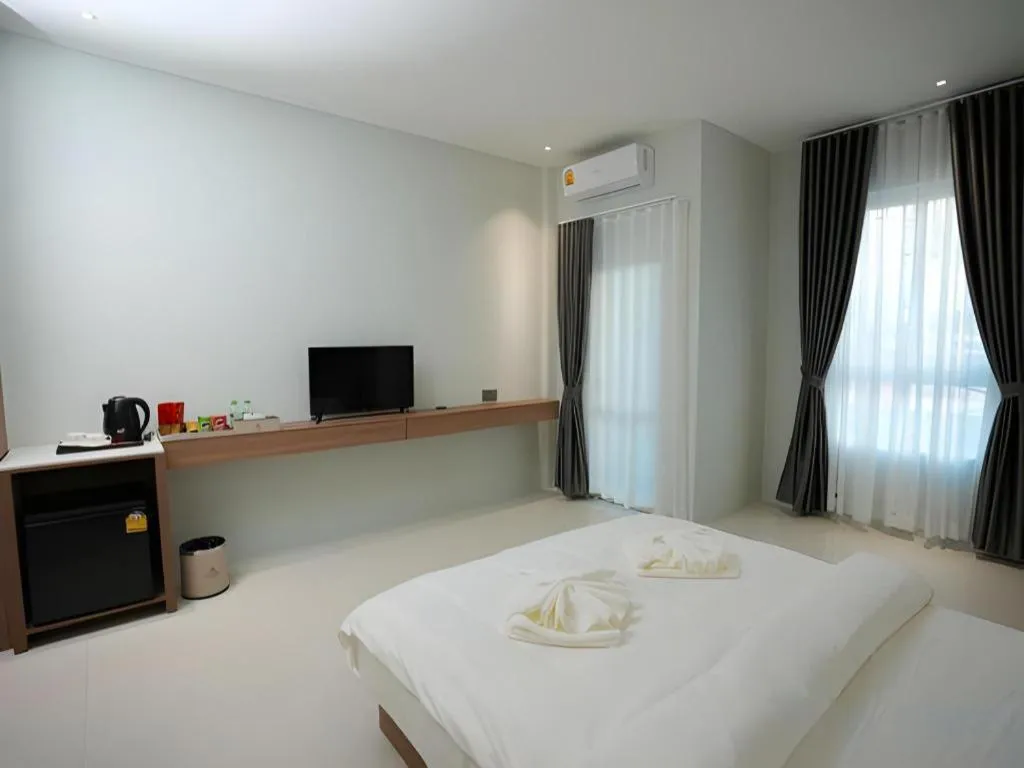 Bed in Athenee Hotel Vientiane