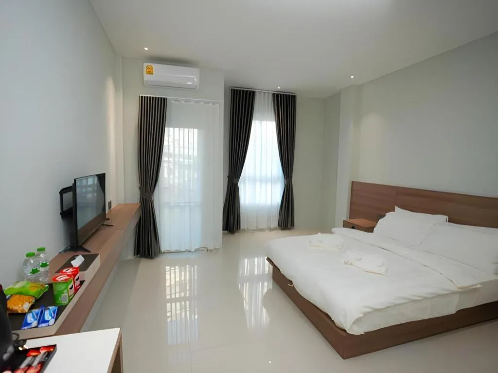 Bed in Athenee Hotel Vientiane