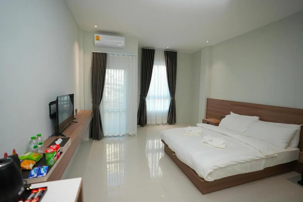 Bed in Athenee Hotel Vientiane