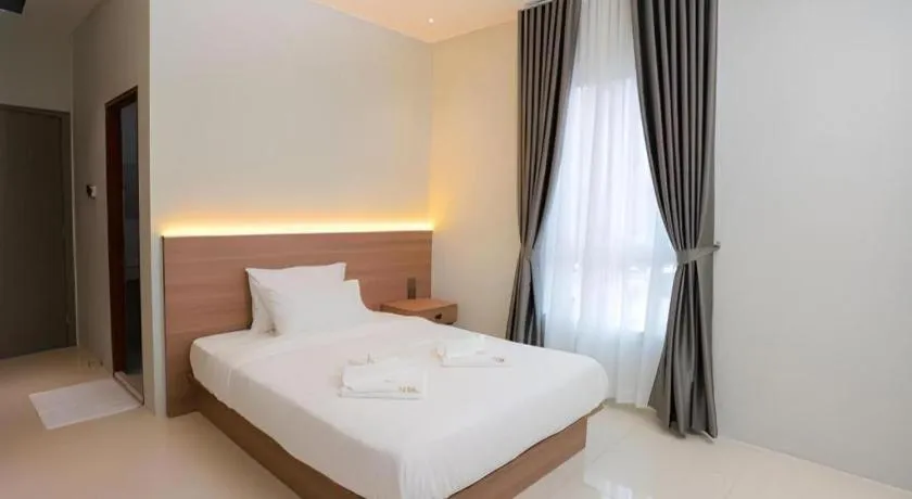 Bed in Athenee Hotel Vientiane