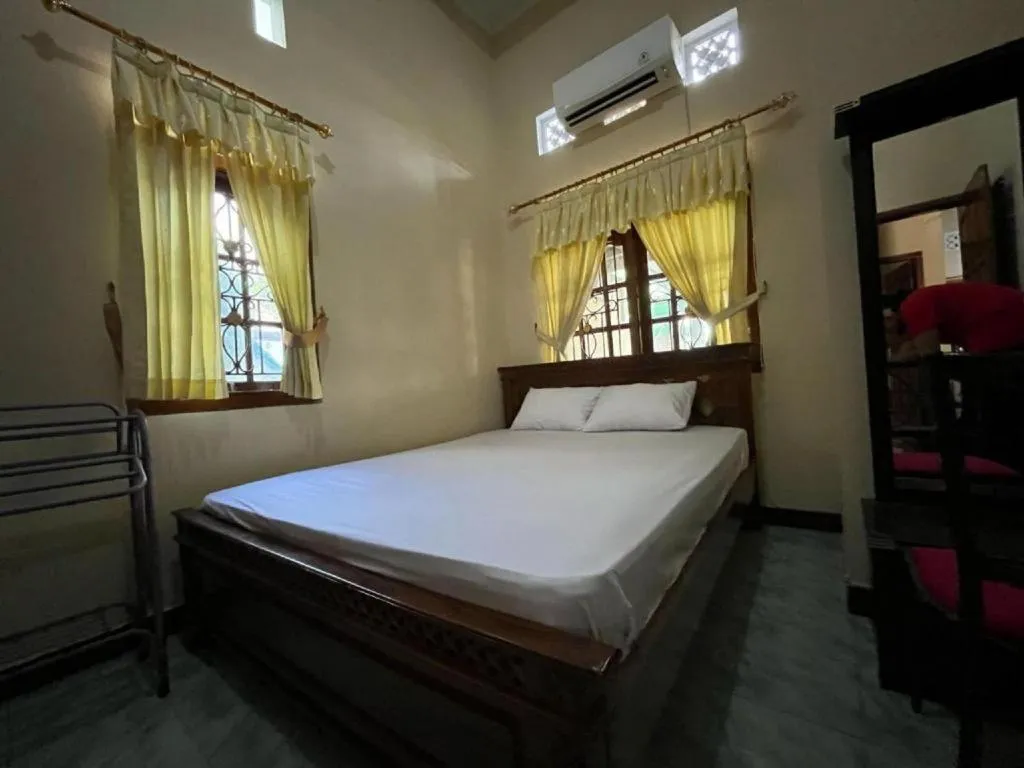 Bed in OYO 94003 Anjuk Ladang Homestay