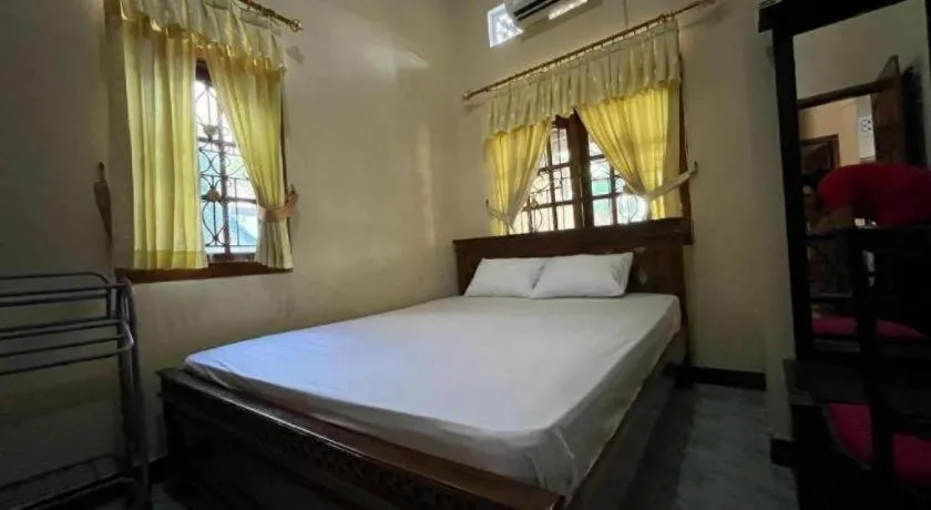 Bed in OYO 94003 Anjuk Ladang Homestay