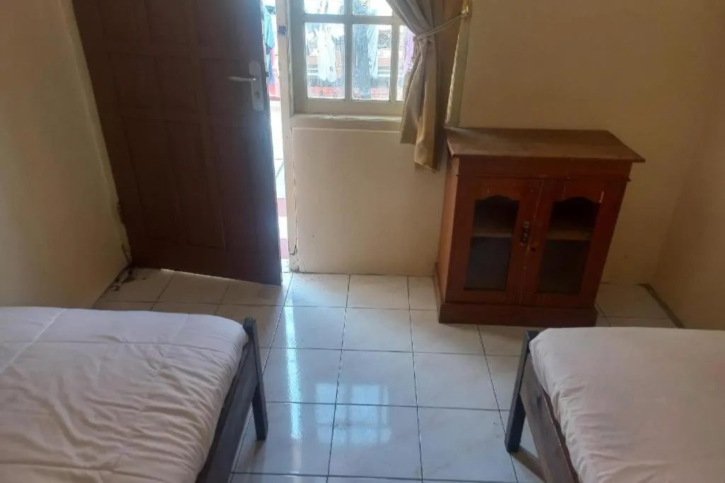 Bed in Hotel O Guest House Wijaya Syariah Near alun alun kota purwokerto