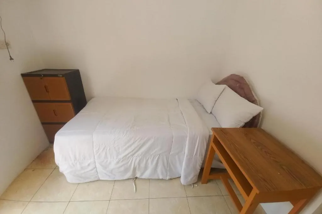 Bed in Hotel O Guest House Wijaya Syariah Near alun alun kota purwokerto