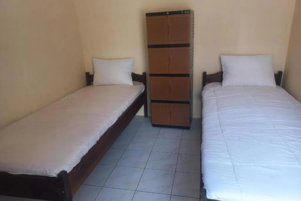 Bed in Hotel O Guest House Wijaya Syariah Near alun alun kota purwokerto