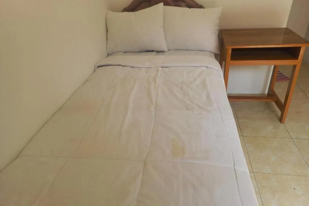 Bed in Hotel O Guest House Wijaya Syariah Near alun alun kota purwokerto