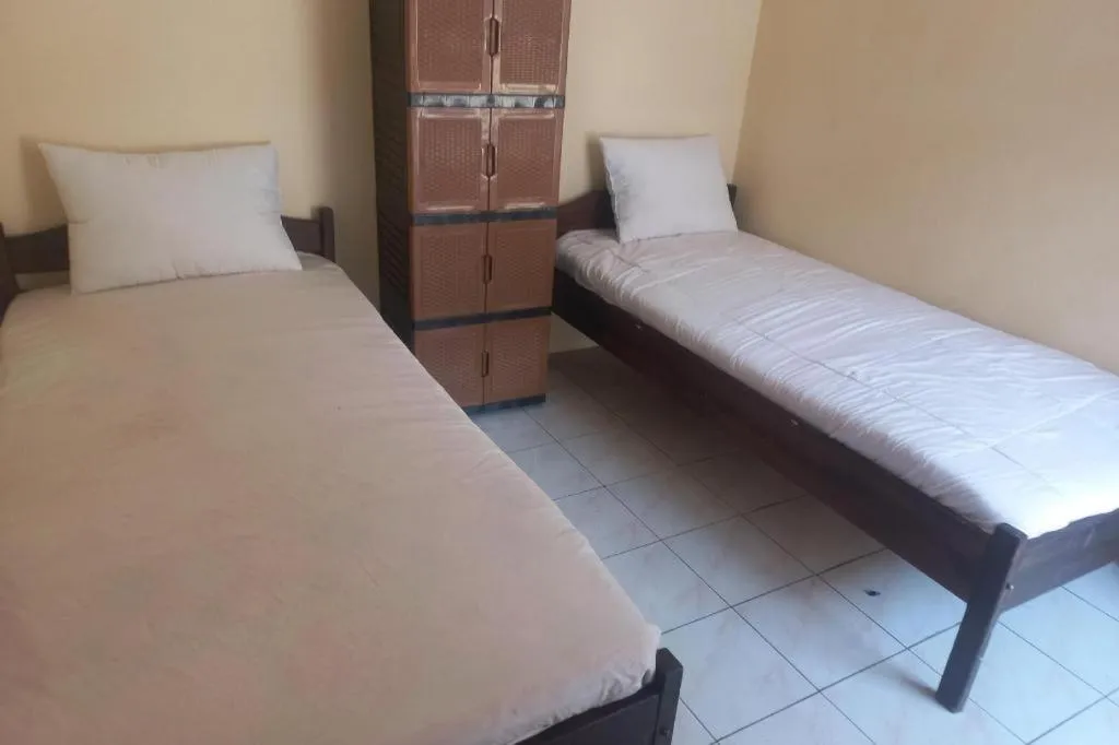 Bed in Hotel O Guest House Wijaya Syariah Near alun alun kota purwokerto