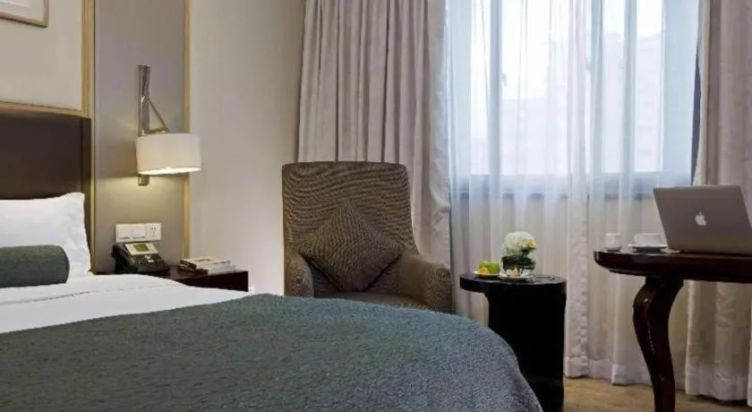 Bed in Meiyuan Hotel Hangzhou