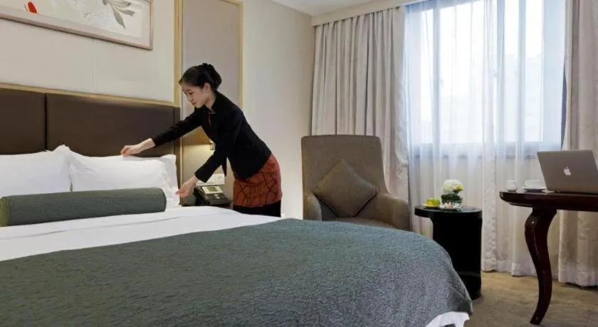 Bed in Meiyuan Hotel Hangzhou