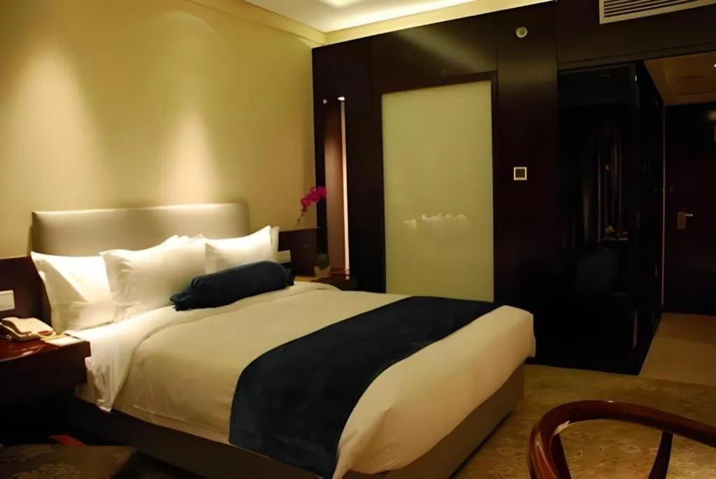 Bed in Meiyuan Hotel Hangzhou