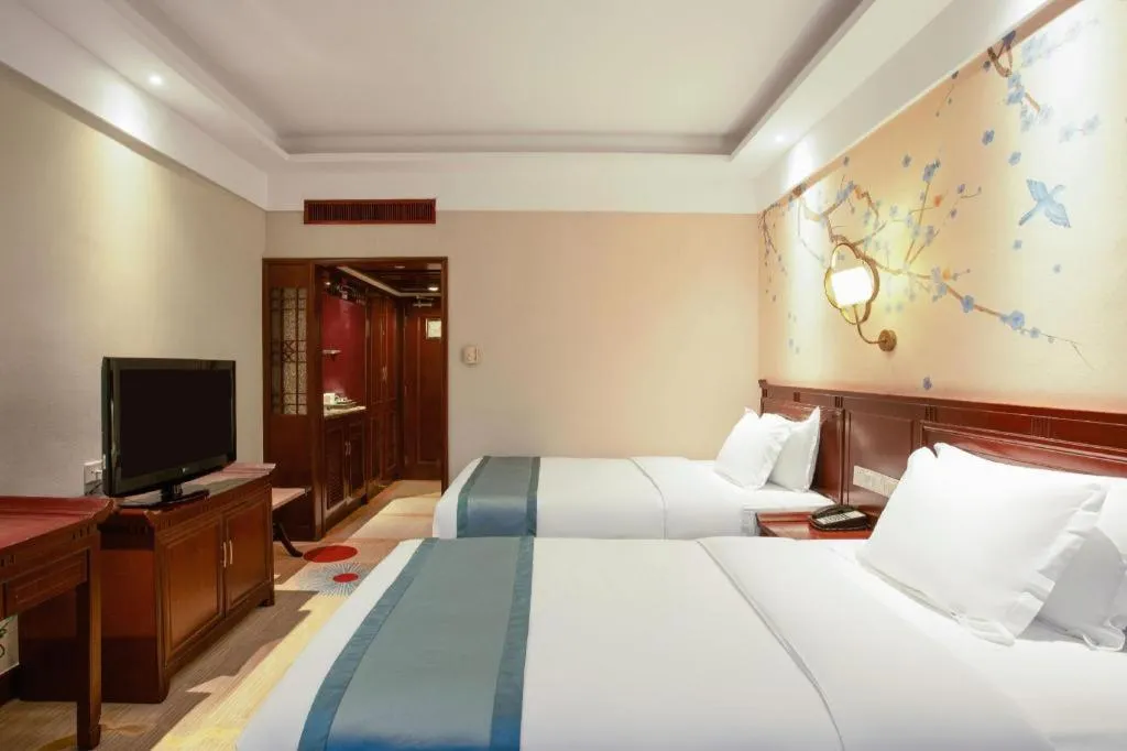 Bed in Meiyuan Hotel Hangzhou