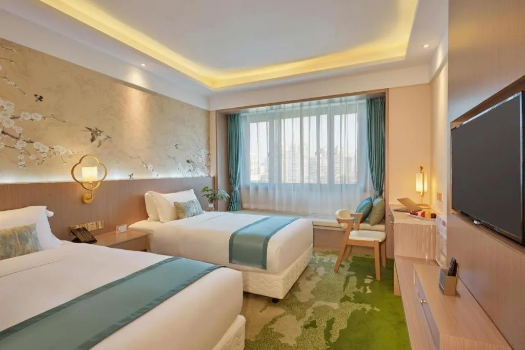 Bed in Meiyuan Hotel Hangzhou