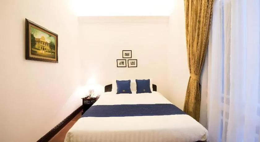 Bed in Hoa Binh Hotel