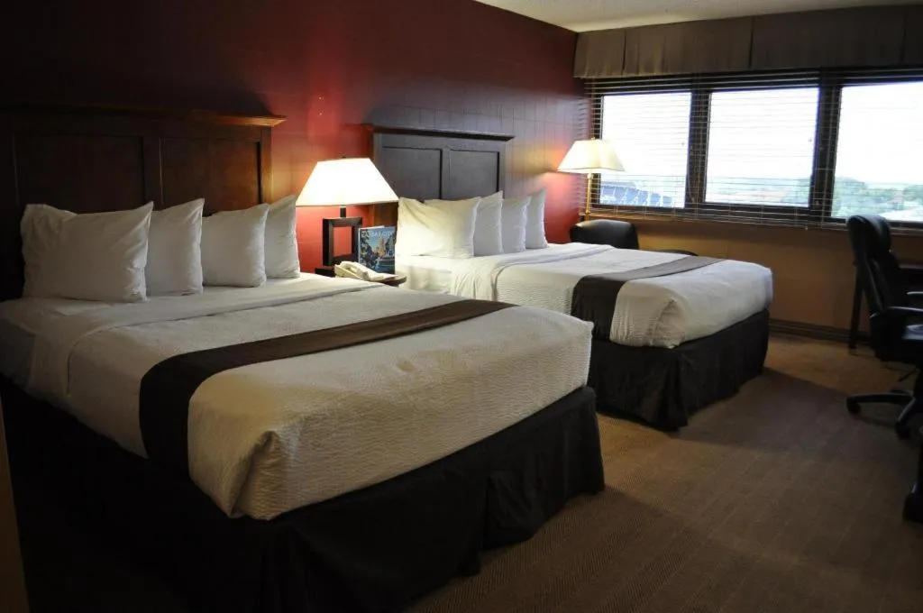 Bed in Adam's Mark Hotel & Conference Center