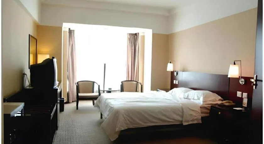 Bed in Dong Fang Hotel