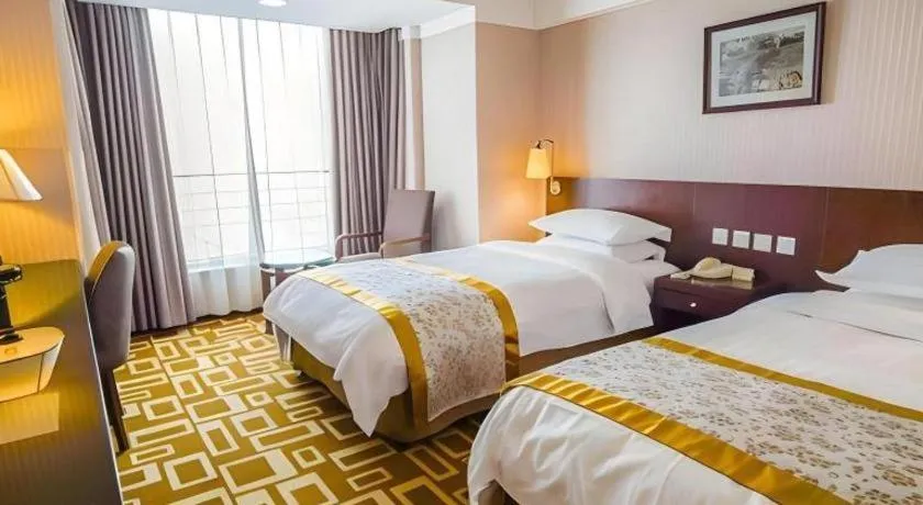 Bed in Dong Fang Hotel