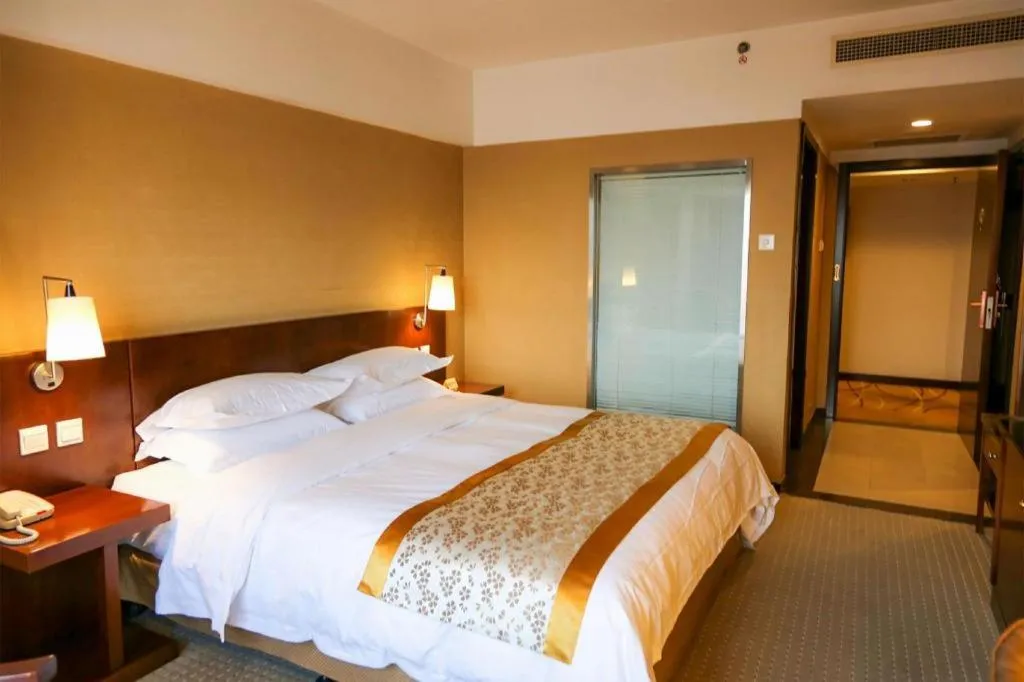 Bed in Dong Fang Hotel