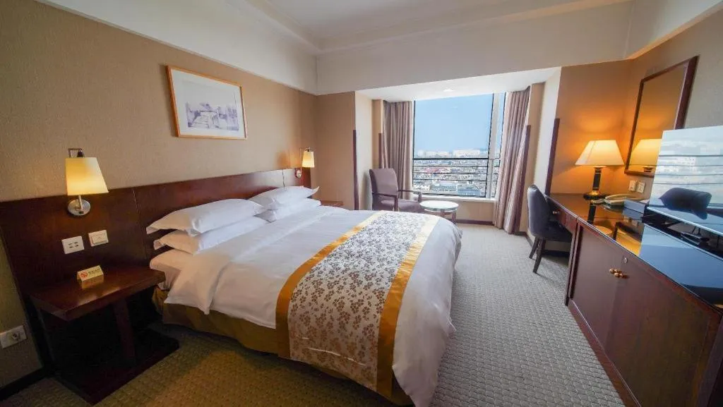 Bed in Dong Fang Hotel