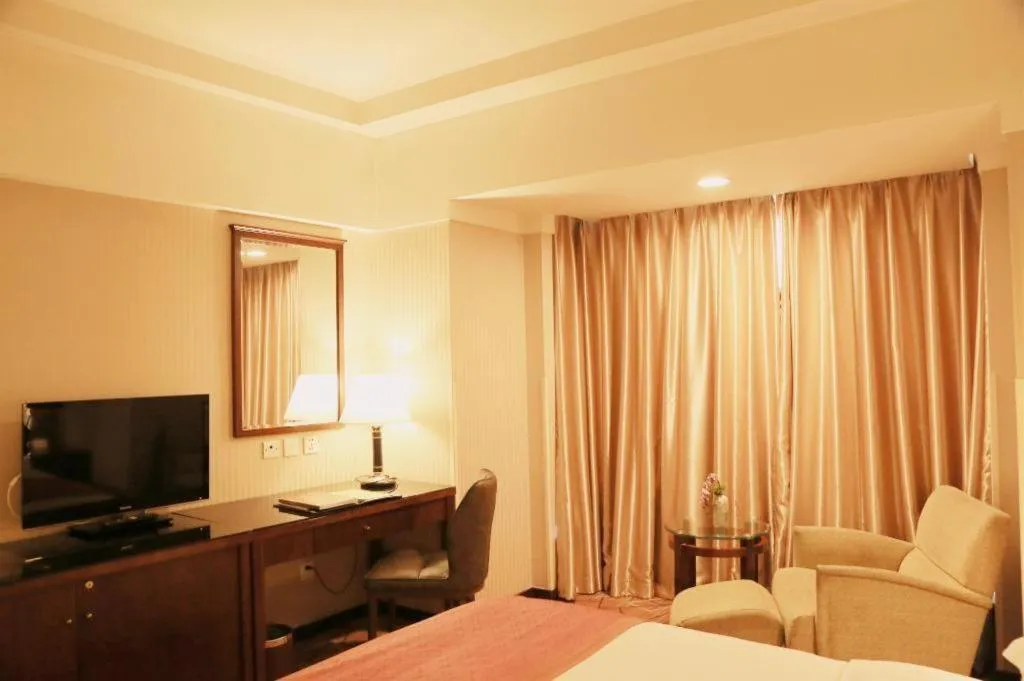 Bed in Dong Fang Hotel