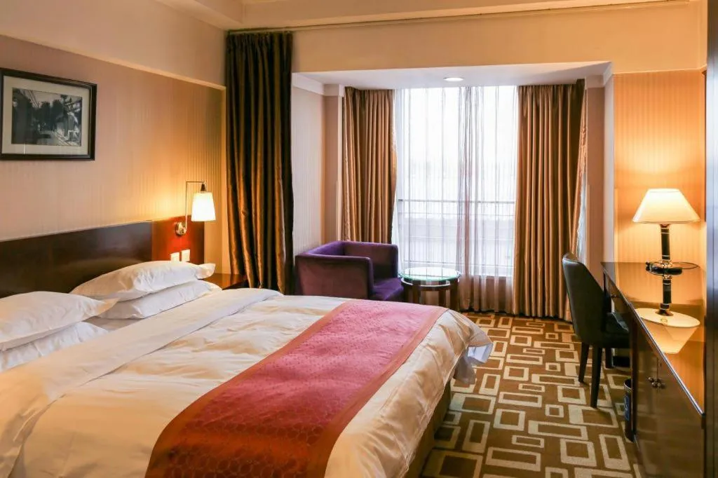 Bed in Dong Fang Hotel