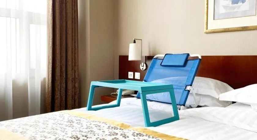 Bed in Dong Fang Hotel