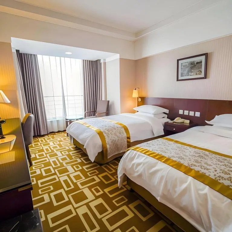 Bed in Dong Fang Hotel