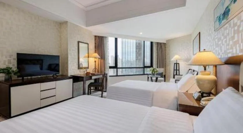 Bed in Hainan Junhua Haiyi Hotel