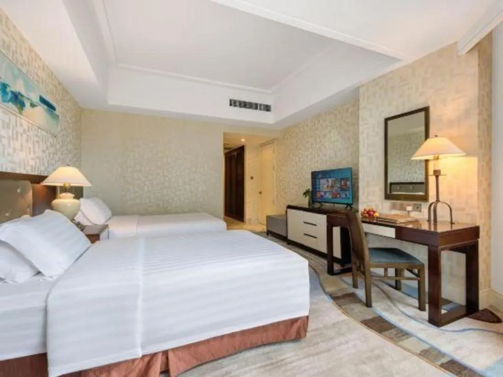 Bed in Hainan Junhua Haiyi Hotel