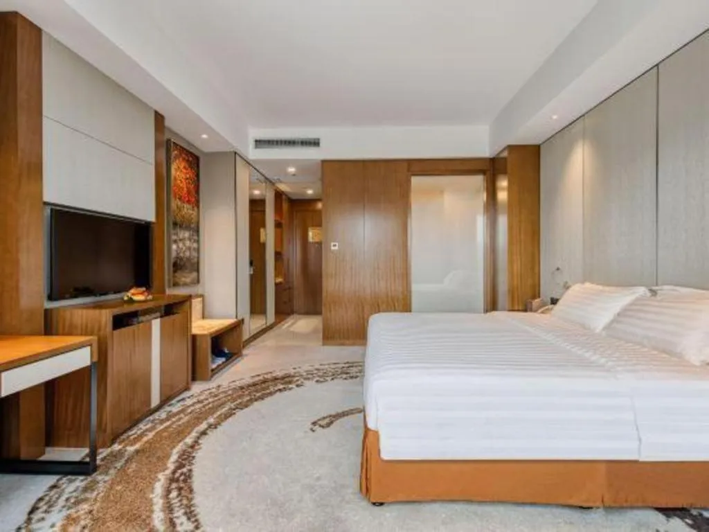 Bed in Hainan Junhua Haiyi Hotel