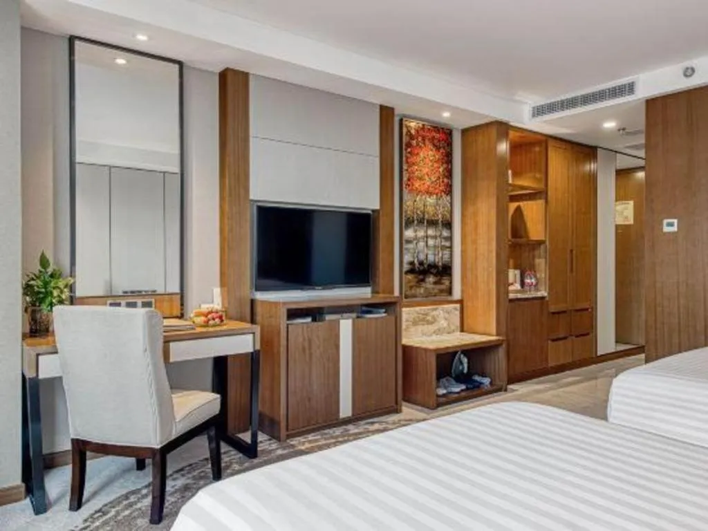 Bed in Hainan Junhua Haiyi Hotel