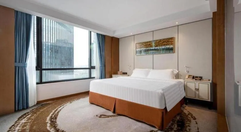 Bed in Hainan Junhua Haiyi Hotel