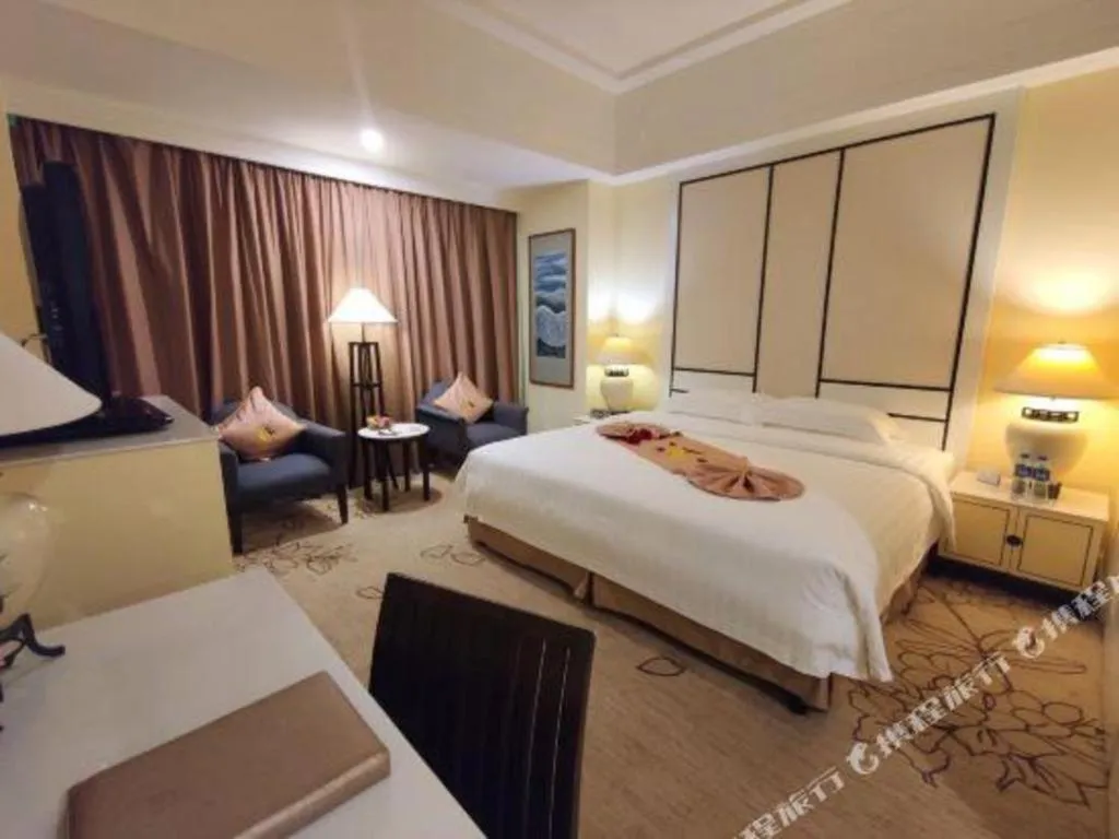 Bed in Hainan Junhua Haiyi Hotel