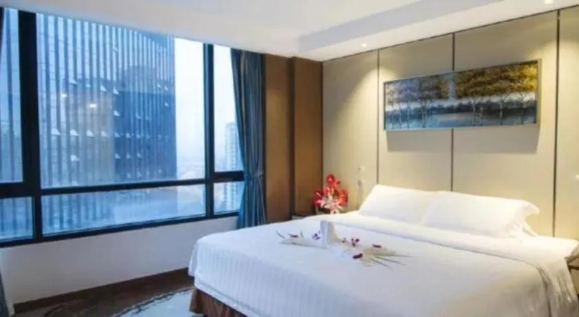 Bed in Hainan Junhua Haiyi Hotel