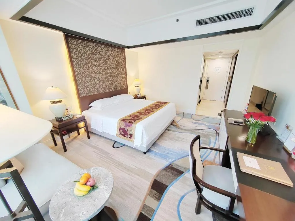 Bed in Hainan Junhua Haiyi Hotel