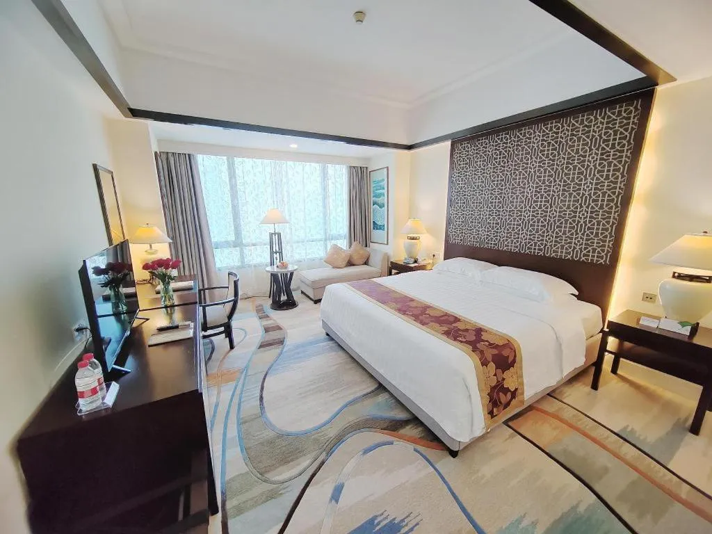 Bed in Hainan Junhua Haiyi Hotel