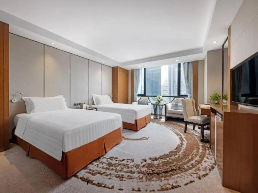 Bed in Hainan Junhua Haiyi Hotel