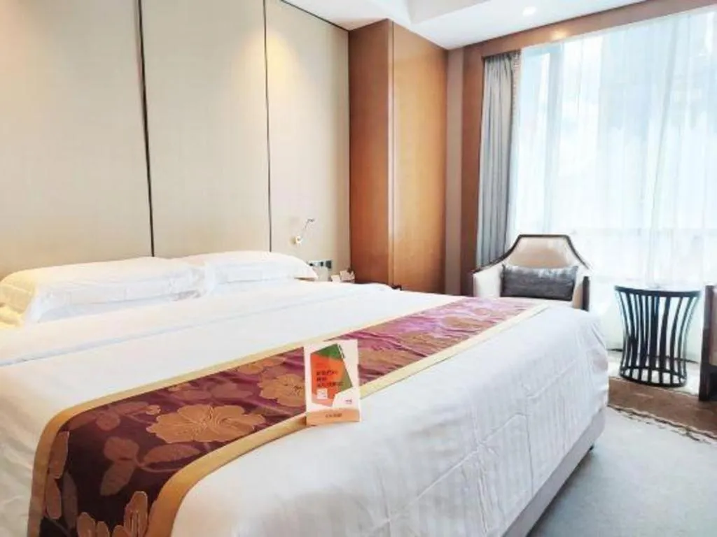 Bed in Hainan Junhua Haiyi Hotel