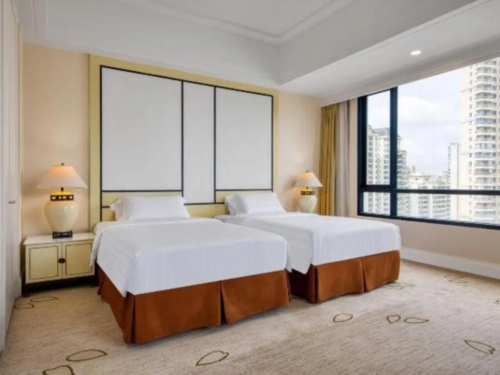 Bed in Hainan Junhua Haiyi Hotel