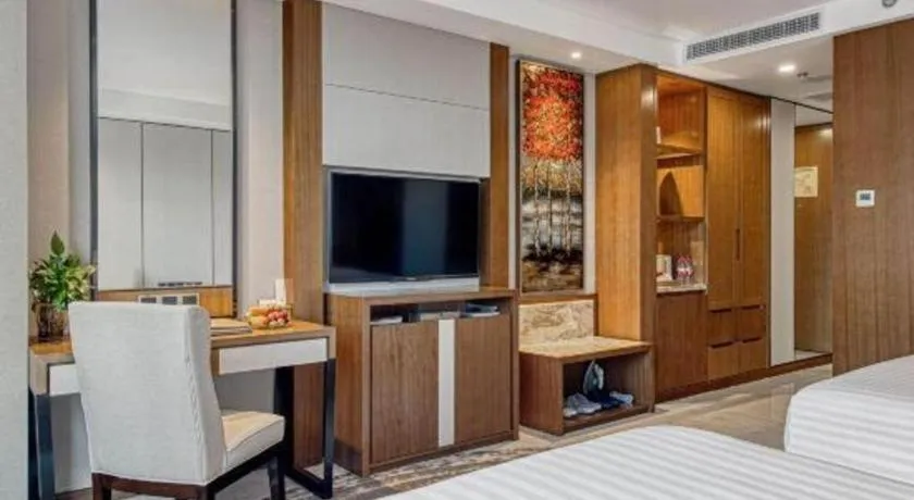 Bed in Hainan Junhua Haiyi Hotel