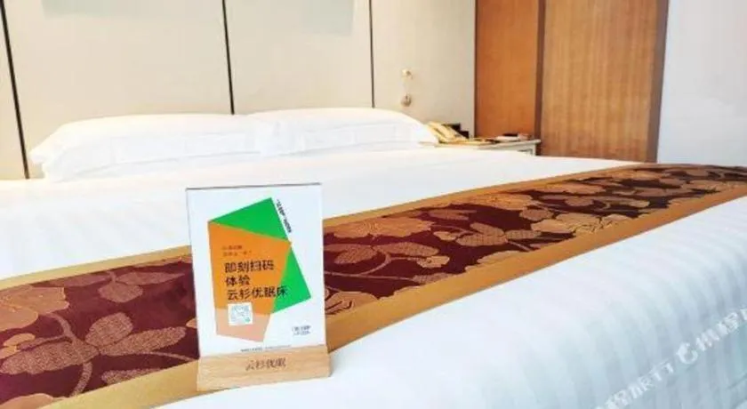 Bed in Hainan Junhua Haiyi Hotel