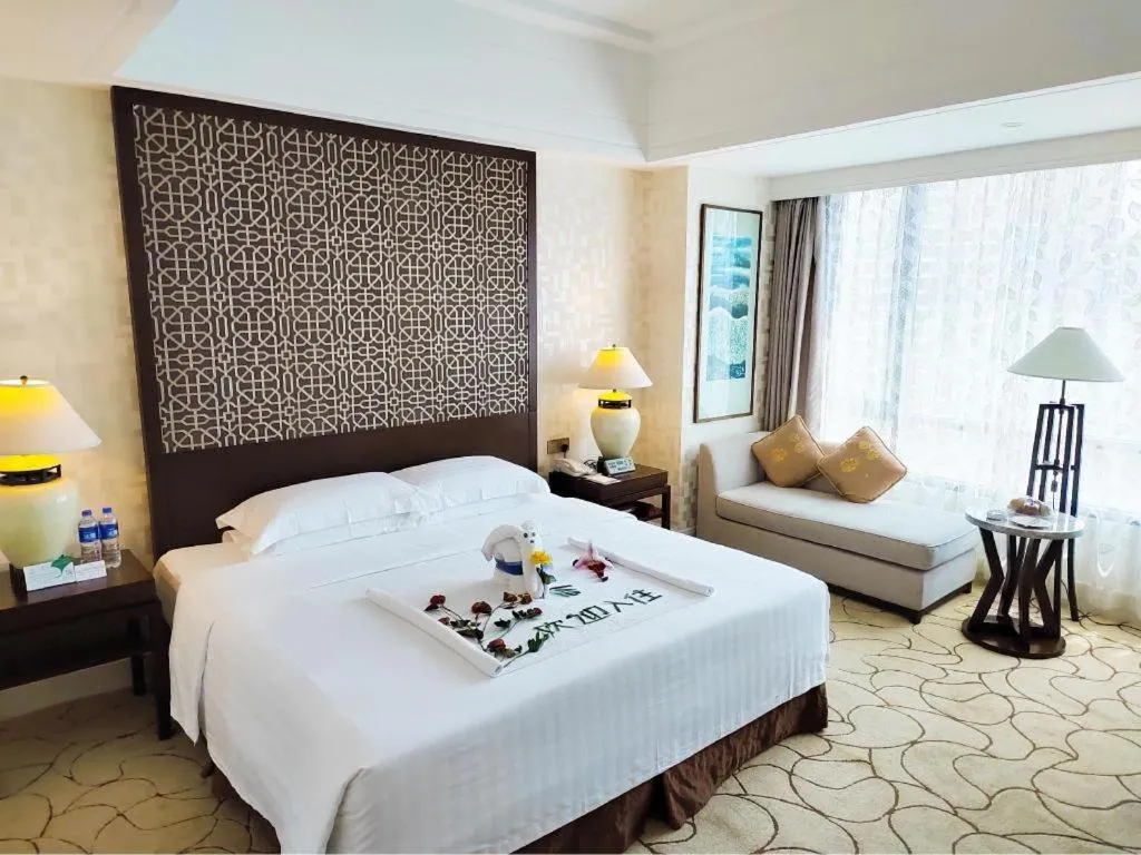 Bed in Hainan Junhua Haiyi Hotel