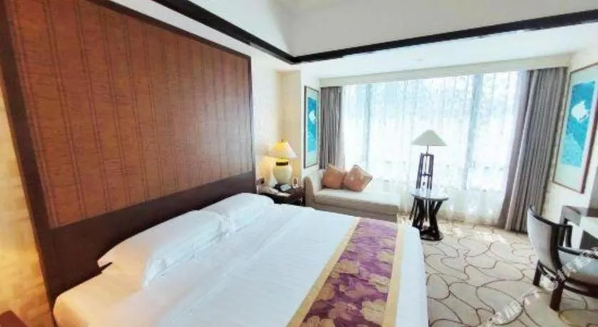 Bed in Hainan Junhua Haiyi Hotel