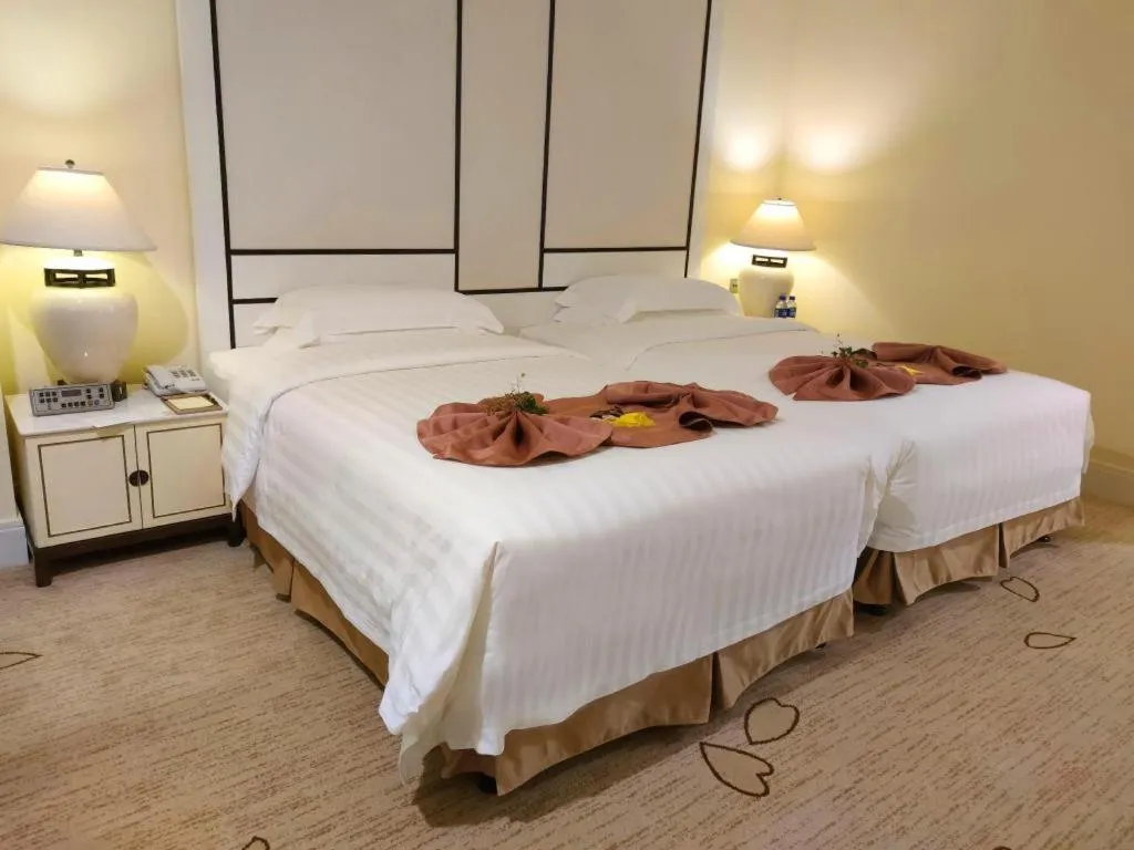 Bed in Hainan Junhua Haiyi Hotel